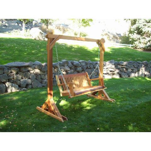 Cedar A-frame porch swing stand set up on a porch, an example of the freestanding stands this maintenance guide covers