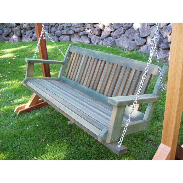 Natural wood cedar porch swing ready for refinishing on a front porch