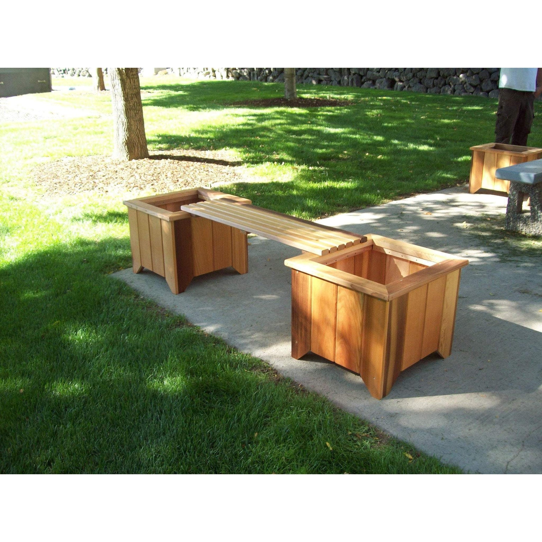 Wood Country cedar planter box and bench set staged on a porch, an example of pairing planters with porch seating