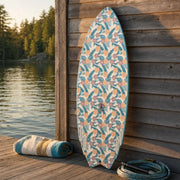 Smoke Show Wake Surfboard – Floral Inlay Aqua on a lake dock at golden hour (AI-generated visualization)