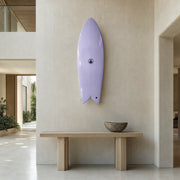 The Finlet Twin Fin Fish Surfboard - Lilac EPS mounted on the wall of a high-end space (AI-generated visualization)