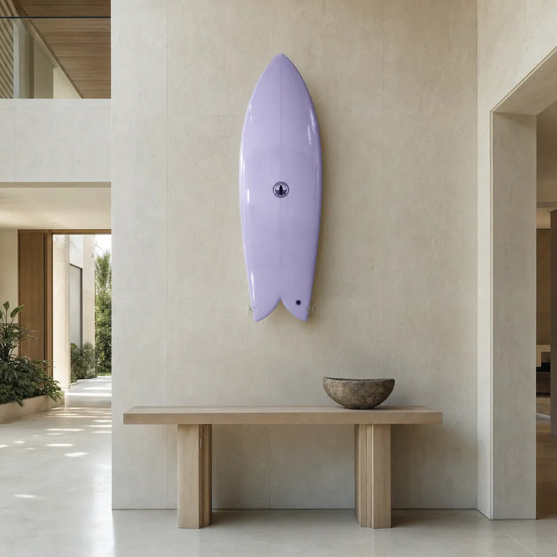 The Finlet Twin Fin Fish Surfboard - Lilac EPS mounted on the wall of a high-end space (AI-generated visualization)